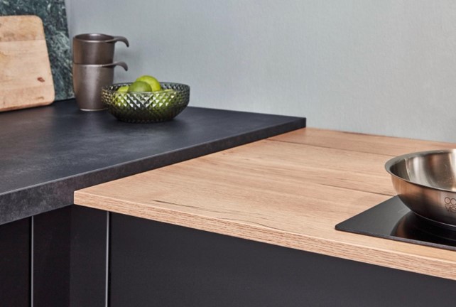 Close-up of kitchen top ideas featuring durable granite and wood countertops for a stylish and functional kitchen.